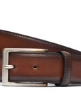 Handcrafted Antiqued Belt - Earth. Tumbled and dyed calf leather. A 120cm waist measurement corresponds to a size 60 pant. Total belt length (including buckle) is 135cm. 3.5cm metal buckle with a brushed finish. The belt is adjustable with a screw on the back and is very easy to cut.- Sartoria Dei Duchi - Atri