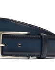 Handcrafted Antiqued Belt - Ocean. Tumbled and dyed calf leather. A 120cm waist measurement corresponds to a size 60 pant. Total belt length (including buckle) is 135cm. 3.5cm metal buckle with a brushed finish. The belt is adjustable with a screw on the back and is very easy to cut.- Sartoria Dei Duchi - Atri
