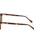 Sunglasses with tortoiseshell frame and brown lenses on a light gray background. - DEI DUCHI