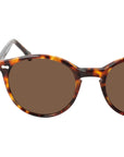 Sunglasses with tortoiseshell frame and brown lenses on a light gray background. - DEI DUCHI
