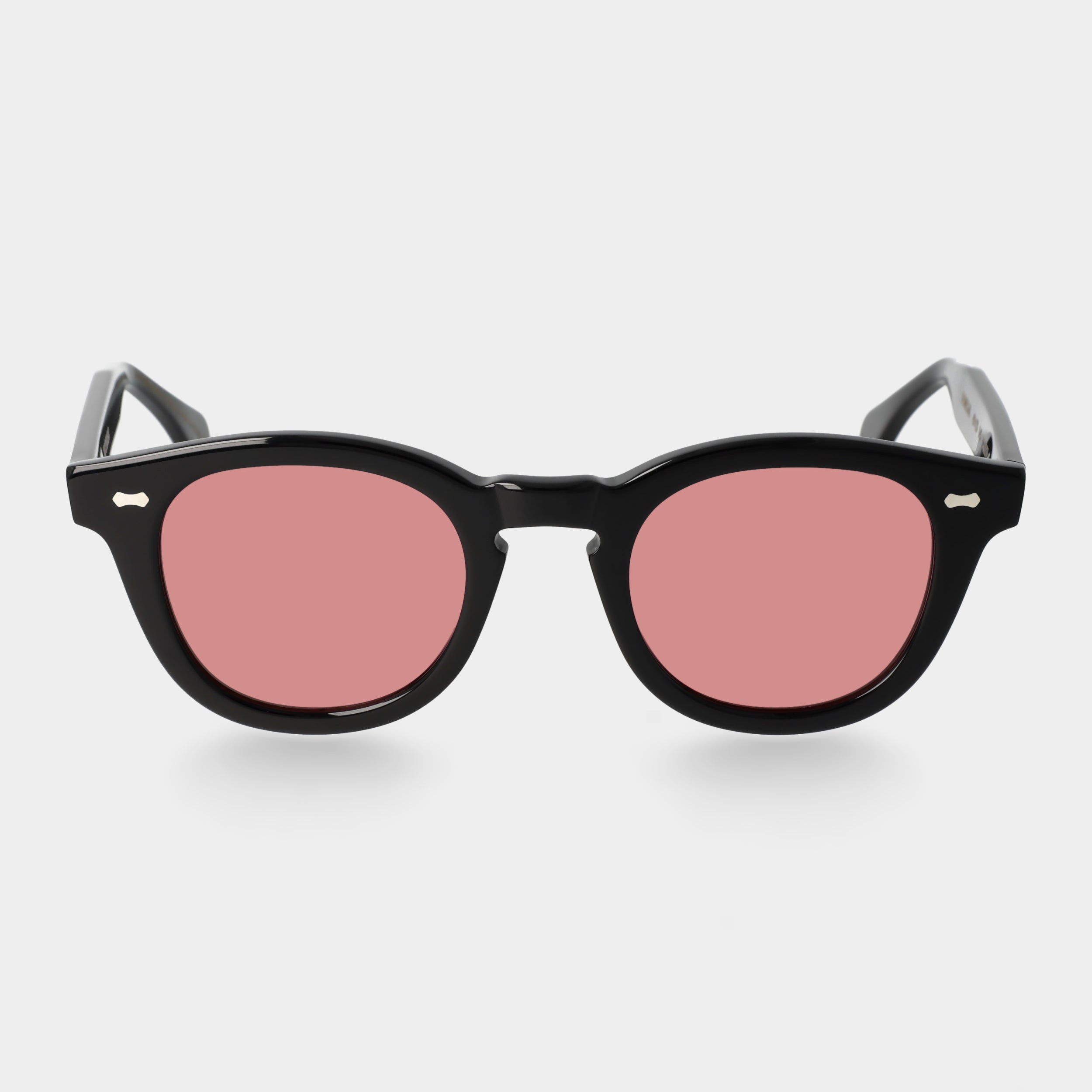Black sunglasses with pink lenses on a white background. - DEI DUCHI
