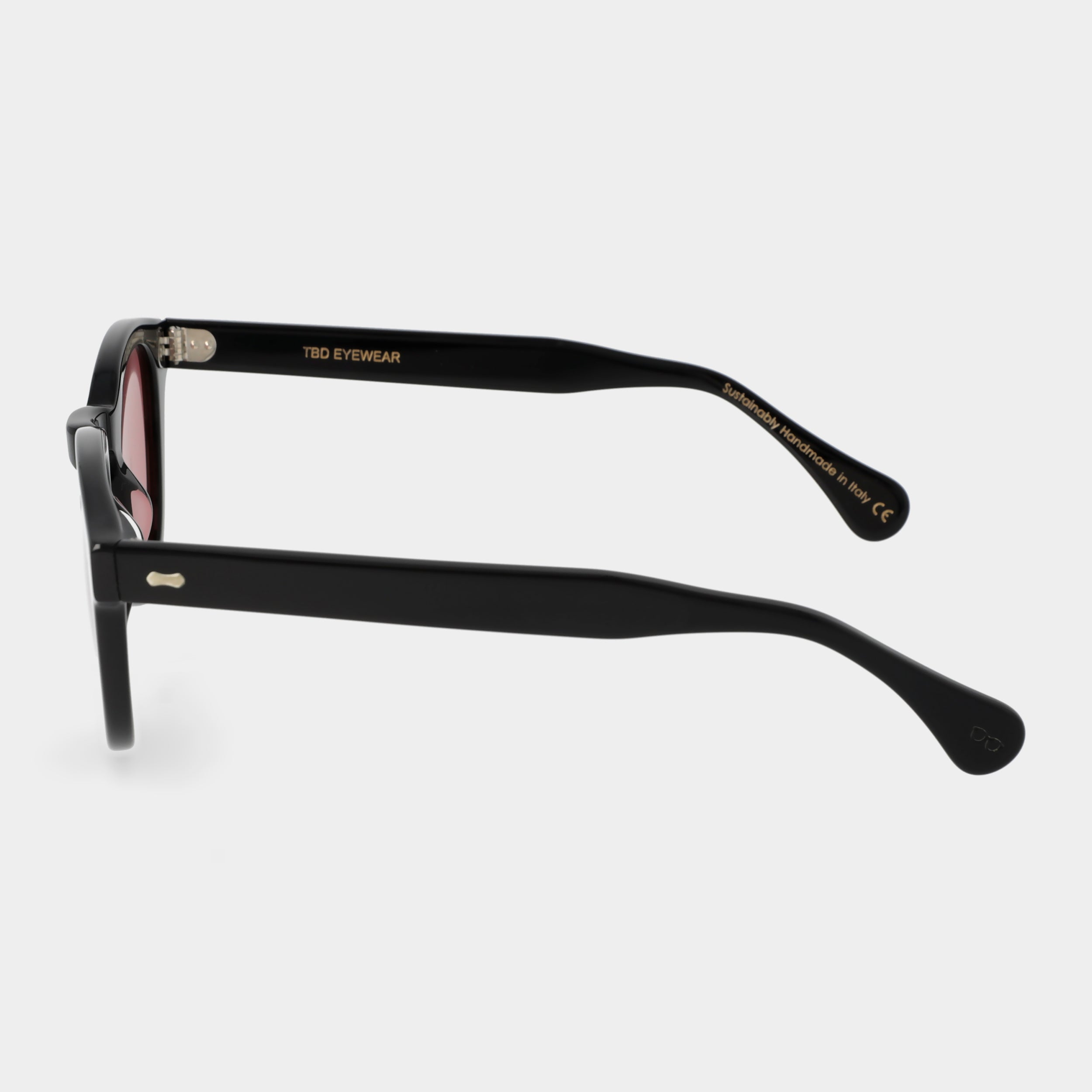 Black sunglasses with pink lenses on a white background. - DEI DUCHI