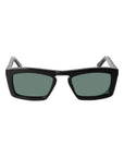 Black sunglasses with green lenses on a light gray background. - Dei Duchi