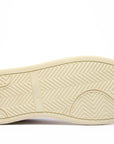 Santè - Natural White. Comfortable Fit. The Sante men's sneakers. Made in Italy excellence. Crafted on the Brenta Riviera. The soft-crust calfskin, tanned in Tuscany, treated with Patina Delavé technique. Dyed leather, faded, and finished with creams and waxes. Ergonomic removable footbed, flexible rubber sole. The Strobel construction, with slip-stitched seams. -Sartoria Dei Duchi-Atri