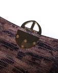 Brown embossed python skin clutch bag with gold chain and buckle/emblem on a white background. - DEI DUCHI (AMALTEA)