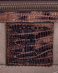 Brown embossed python skin clutch bag with gold chain and buckle/emblem on a white background. - DEI DUCHI (AMALTEA)