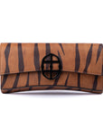 Brown leather wallet with chain strap
and embossed tiger stripe pattern and burnished metal buckle clasp on a white background. -DEI DUCHI (AMALTEA)