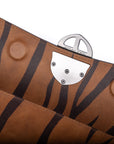 Brown leather wallet with embossed tiger stripe pattern and gold metal buckle clasp on a white background. -DEI DUCHI (AMALTEA)