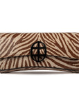 Zebra embossed pinkish leather clutch bag/wallet with a burnished metallic emblem buckle on a white background. - DEI DUCHI (AMALTEA)