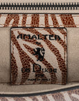 Zebra embossed pinkish leather clutch bag/wallet with a burnished metallic emblem buckle on a white background. - DEI DUCHI (AMALTEA)