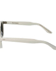 Sunglasses with white frame and dark lenses on a light gray background. - Dei Duchi (TBD Eyewear)