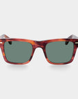 Sunglasses with tortoiseshell frame and green lenses on a light gray background. - DEI DUCHI