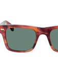 Sunglasses with tortoiseshell frame and green lenses on a light gray background. - DEI DUCHI