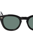 Black sunglasses with green lenses on a white background. - DEI DUCHI
