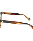 Sunglasses with tortoiseshell frame and green lenses on a white background. - DEI DUCHI