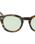 Sunglasses with tortoiseshell frame and green lenses on a white background. - DEI DUCHI