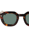 Sunglasses with tortoiseshell frame and dark lenses on a white background. - Dei Duchi