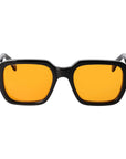 Sunglasses with yellow lenses and black frames on a white background. - DEI DUCHI