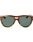 Sunglasses with tortoiseshell frame and green lenses on a light gray background. - DEI DUCHI