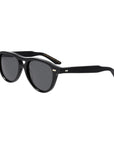 Black sunglasses with dark lenses on a light gray background. - DEI DUCHI
