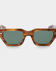 Sunglasses with tortoiseshell frame and green lenses on a white background. - DEI DUCHI