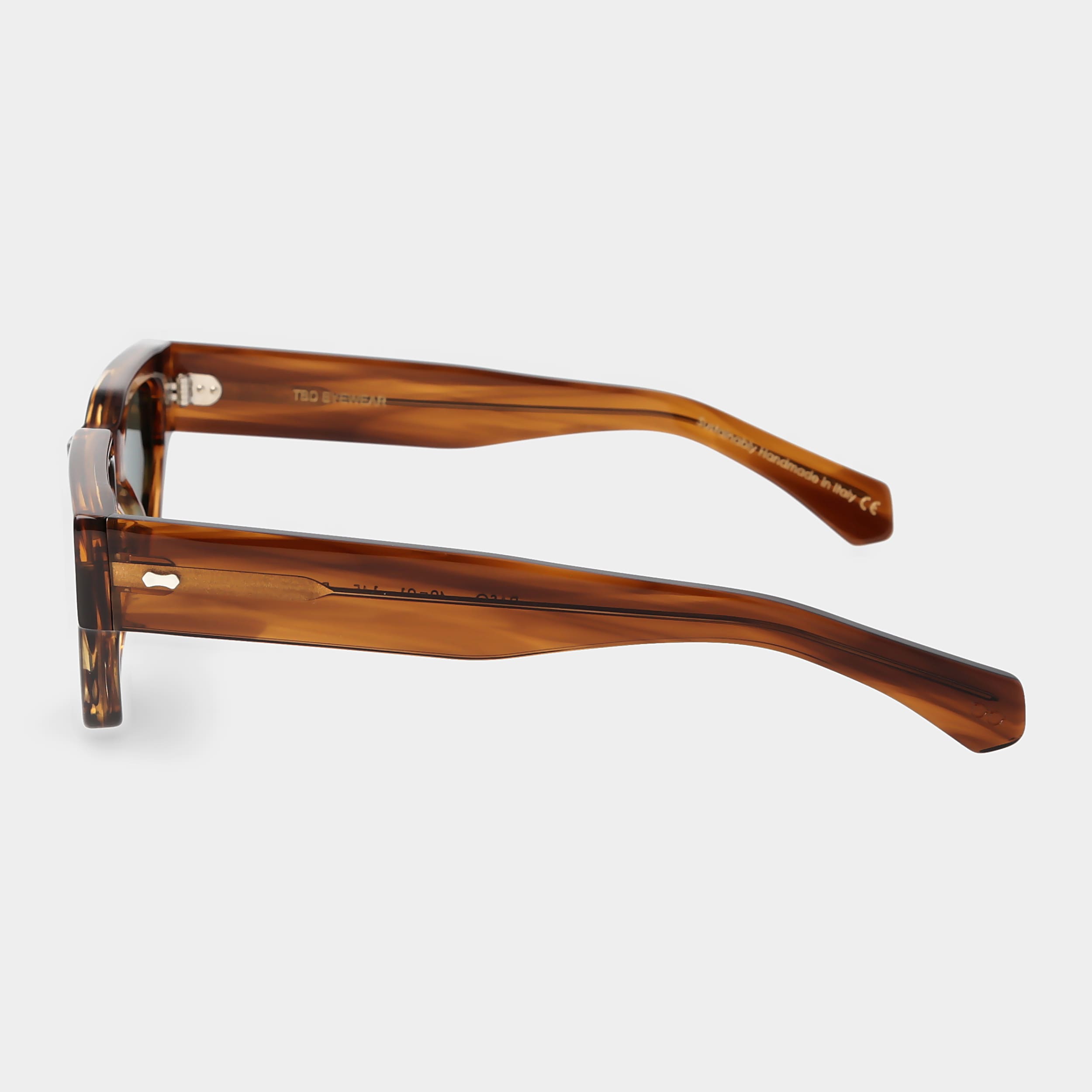 Sunglasses with tortoiseshell frame and green lenses on a white background. - DEI DUCHI