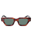 Sunglasses with tortoiseshell frame and dark lenses on a white background. - DEI DUCHI