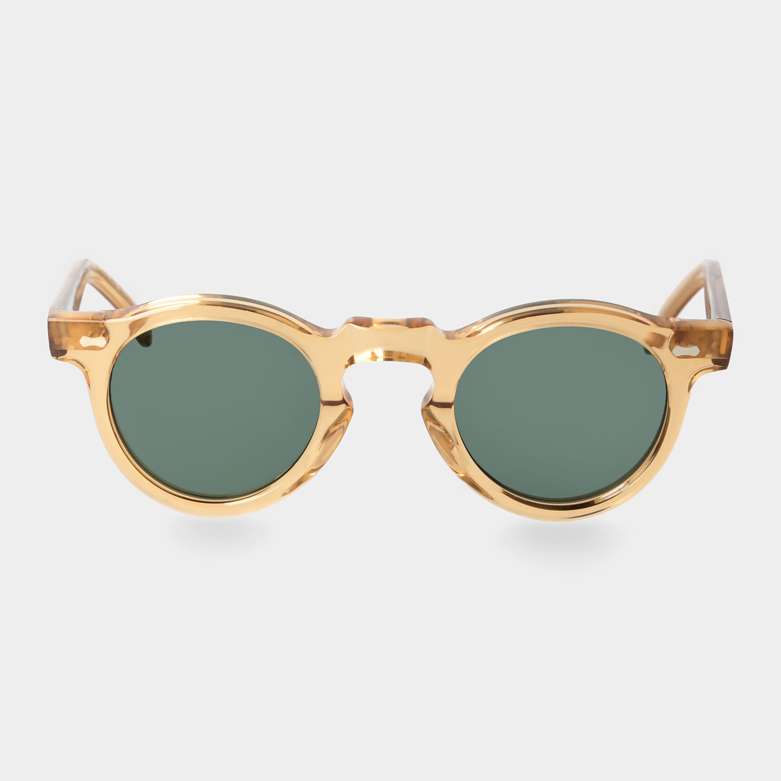 Gold-framed round sunglasses with green lenses on a light gray background. - DEI DUCHI
