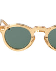 Gold-framed sunglasses with green lenses on a white background. - Dei Duchi