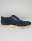 Blue English style Derby shoes with dovetail hole, 100% MADE IN ITALY, in buffered calf leather, handcrafted with wax and brush to obtain a shoe with an aged effect with characteristic shades. With leather sole and BLAKE stitching to ensure the tightness of the bottom. Shape with regular plant suitable for a wide audience. | Sartoria Dei Duchi - Atri