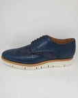 Blue English style Derby shoes with dovetail hole, 100% MADE IN ITALY, in buffered calf leather, handcrafted with wax and brush to obtain a shoe with an aged effect with characteristic shades. With leather sole and BLAKE stitching to ensure the tightness of the bottom. Shape with regular plant suitable for a wide audience. | Sartoria Dei Duchi - Atri