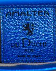 Close-up of a blue leather label with 'Amaltea for Del Duchi Atki' text and logo.