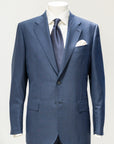 Blue suit with matching tie and pocket square on a mannequin against a white background. - Sartoria Dei Duchi-Atri