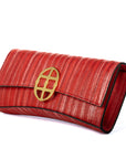 Red clutch bag with a gold emblem on a white background - DEI DUCHI (ALMATEA)