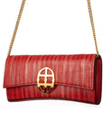 Red handbag with a chain detail, Red clutch bag with a gold emblem on a white background - DEI DUCHI (ALMATEA)