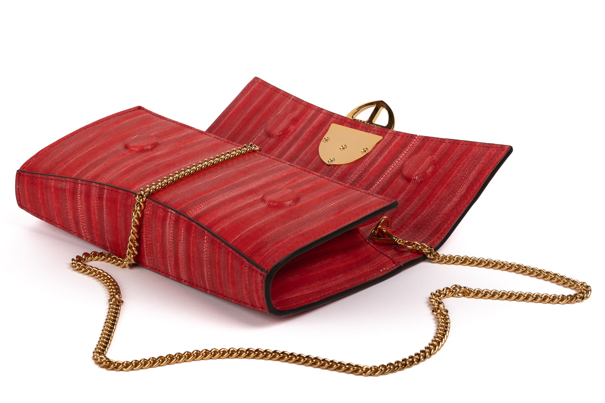Red handbag with a chain detail, Red clutch bag with a gold emblem on a white background - DEI DUCHI (ALMATEA)