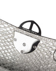 Close-up of a silvery snake textured leather bag with an ENGRAVED 'AMALTEA' branding on burnished metal buckle on a white background. - DEI DUCHI (AMALTEA)