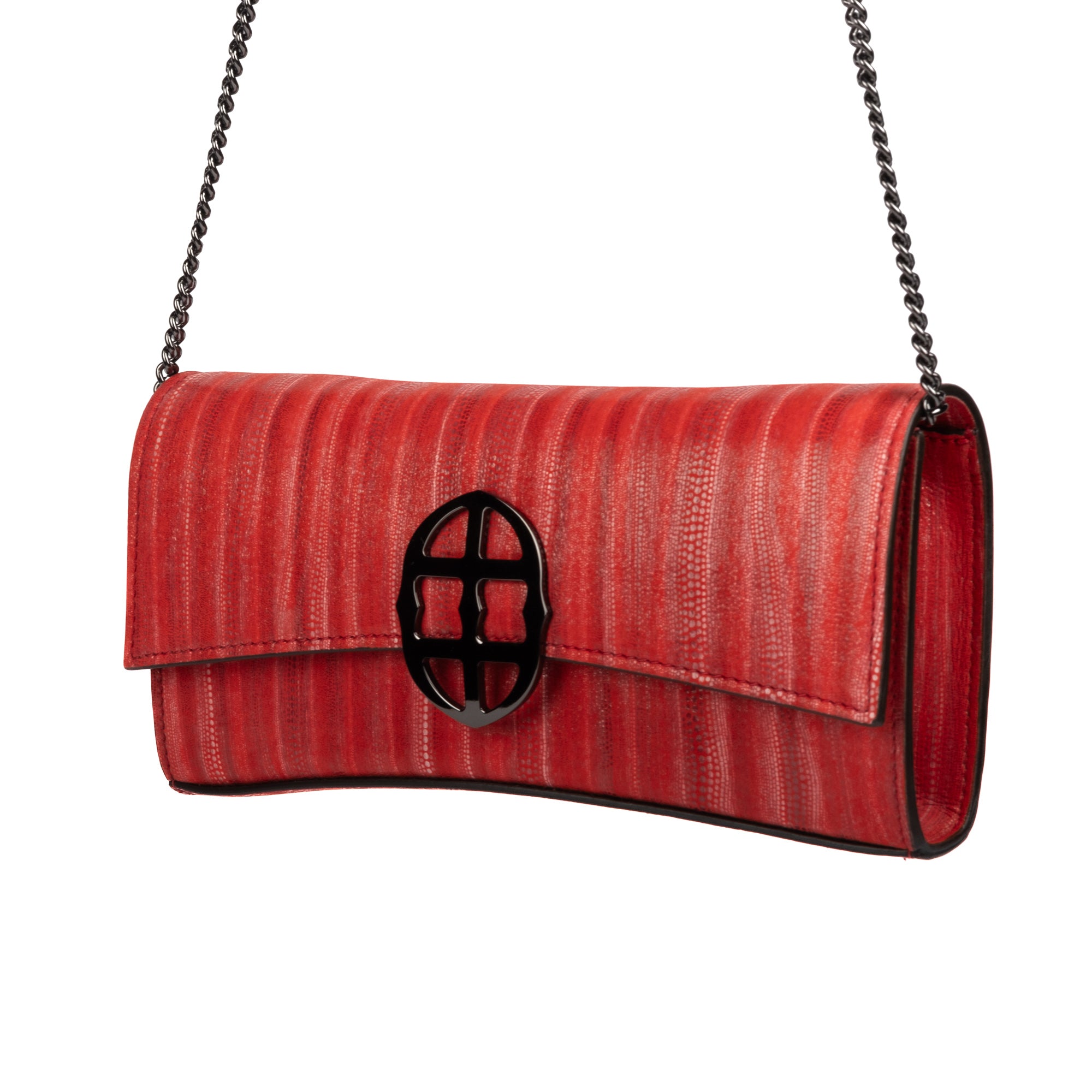 Red handbag with a chain detail, Red clutch bag with a burnished metal emblem on a white background - DEI DUCHI (ALMATEA)