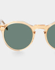 Gold-framed sunglasses with green lenses on a light gray background. - DEI DUCHI
