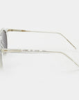 Round sunglasses with clear frame and dark lenses on a white background. - DEI DUCHI