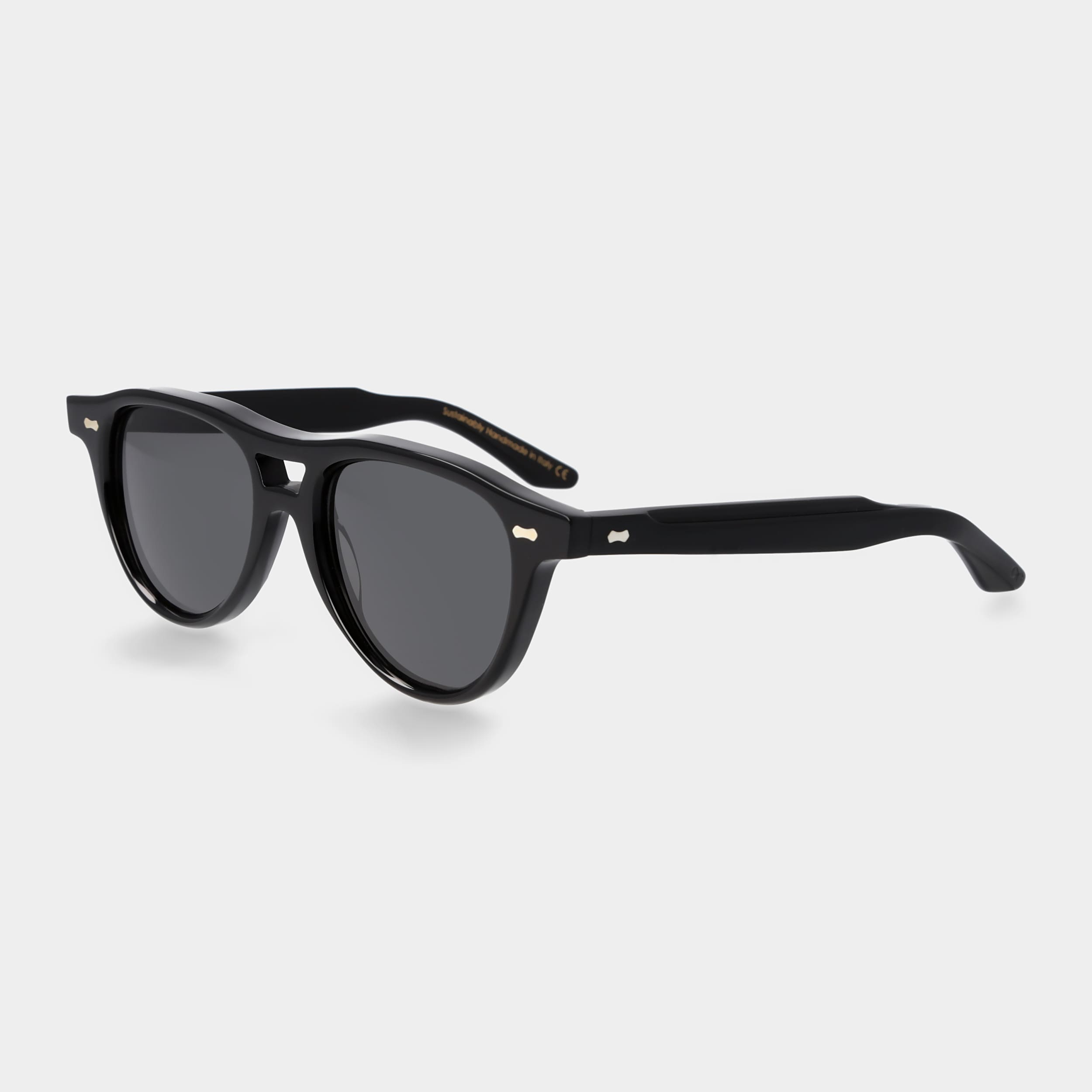 Black sunglasses with dark lenses on a light gray background. - DEI DUCHI