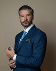 Made with Loro Piana textile 100% Pure Wool, available in Super 150s, 170s and 200s, Aragona suit is a single-breasted two-button jacket, with classic lapel and two slits on the back. The slim trousers have no pleats.Buttonholes, pockets, garments and all finishes are handmade by Italian tailors. This Italian tailored suit is snug, yet extremely comfortable, and perfect for business occasions | Sartoria Dei - Duchi