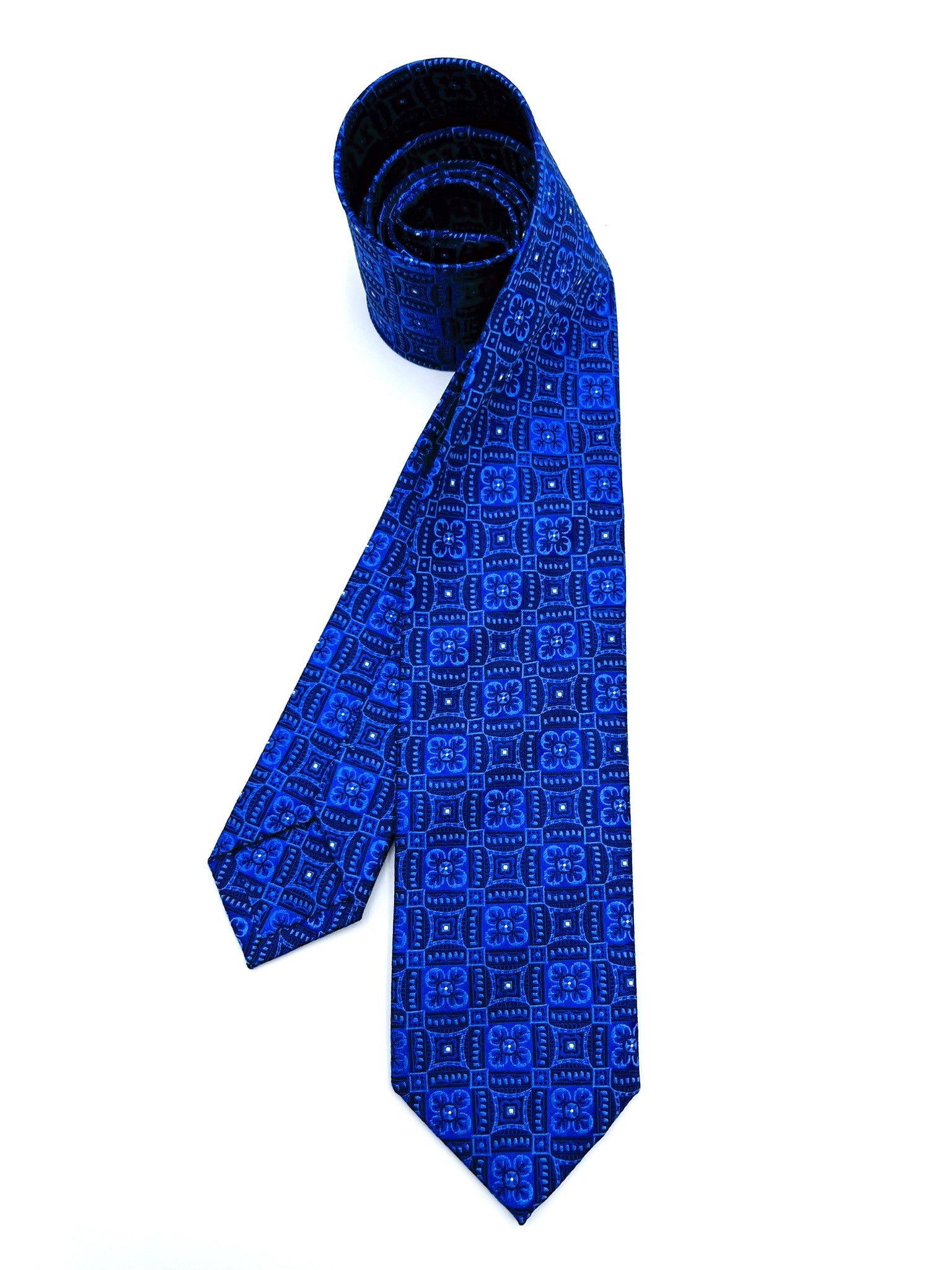 Blue Geometric Pattern Silk Tie. Pure silk three fold tie. Handmade by our Italian tailors. 100% Pure silk.Our ties standard  width is 8 cm (3.15 inch).| Sartoria Dei Duchi - Atri