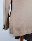 Handmade Cashmere & Vicuna jacket. Single breasted, two-button, 100% Camel Hair versions. Classic pocket trousers, handmade bird's eye pattern. No pleats on front, classic buttoning and belt loop finish. Front American pockets, classic welt pockets w/ button on back. Trousers in cotton finishes and knee pads with lining inside, center slit at the back of the belt. Button holes, pockets, under knack. Suit is fitted, yet extremely comfortable | Sartoria Dei – Duch
