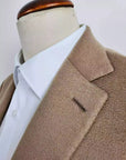 Handmade Cashmere & Vicuna jacket. Single breasted, two-button, 100% Camel Hair versions. Classic pocket trousers, handmade bird's eye pattern. No pleats on front, classic buttoning and belt loop finish. Front American pockets, classic welt pockets w/ button on back. Trousers in cotton finishes and knee pads with lining inside, center slit at the back of the belt. Button holes, pockets, under knack. Suit is fitted, yet extremely comfortable | Sartoria Dei – Duch