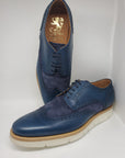 Blue English style Derby shoes with dovetail hole, 100% MADE IN ITALY, in buffered calf leather, handcrafted with wax and brush to obtain a shoe with an aged effect with characteristic shades. With leather sole and BLAKE stitching to ensure the tightness of the bottom. Shape with regular plant suitable for a wide audience. | Sartoria Dei Duchi - Atri