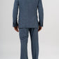 This elegant suit is made with 100% pure merino wool “Super 170s WISH” by Loro Piana. It is characterized by a checked design in shades of gray and light blue. This is a two-piece with two-button jacket with 3 pockets with flaps. One of these pockets is a watch pocket. The pants has regular rise and no darts, with american cut pockets and two back pockets. Belt with loops and zip on the front. -  Sartoria dei Duchi.