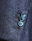 Pure finest Wool and Cashmere suit, with herringbone pattern,  suitable for A/W, fabric by Loro Piana textile.Single-breasted  two-button jacket, with classic lapel.Two slits on the back.The  slim fit trousers have no pleats and no flap on the bottom. Buttonholes, pockets, garments and all finishes are handmade  by Italian tailors.This Italian tailored suit is snug, yet extremely comfortable.  Perfect to look impeccable and professional in your business  occasions.|Sartoria Dei Duchi - Atri