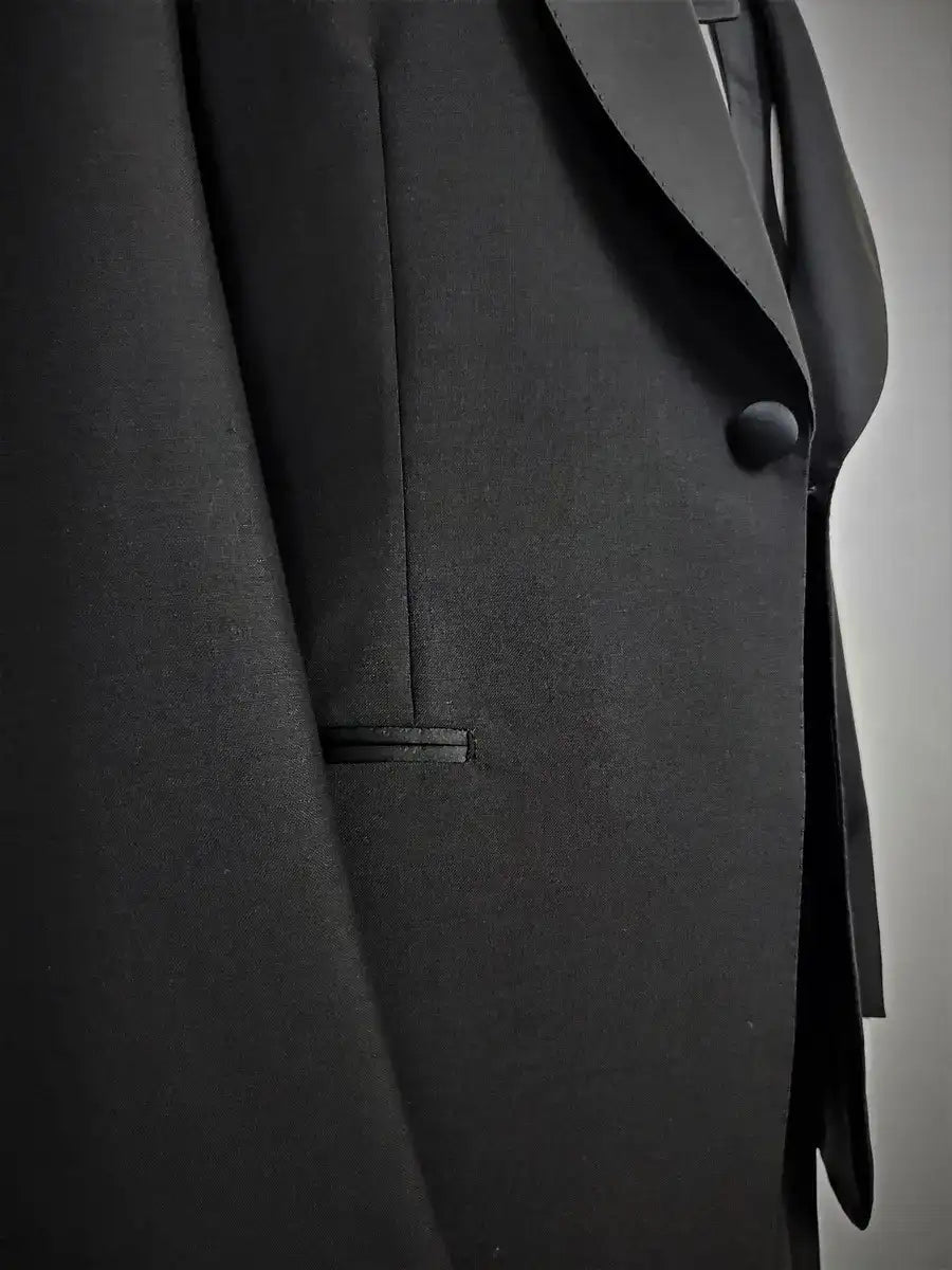 100% Mohair Wool Worsted. Single-breasted jacket w/ one button. Black silk satin shawl collar. Classic pockets. Buttons lined in silk satin. Button holes, pockets, undercollar &amp; finishing touches are handmade. Fitted yet extremely comfortable. TROUSERS: Classic Tuxedo, w/ side band black silk satin. One pleats, slim, w/ internal buttons for suspenders w/ a black silk satin cummerbund &amp; the sweet touch of a black bow-tie.  Also available in blue.|Sartoria Dei Duchi-Atri
