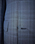 100% Mohair Wool Worsted. Single-breasted jacket w/ one button. Black silk satin shawl collar. Classic pockets. Buttons lined in silk satin. Button holes, pockets, undercollar & finishing touches are handmade. Fitted yet extremely comfortable. TROUSERS: Classic Tuxedo, w/ side band black silk satin. One pleats, slim, w/ internal buttons for suspenders w/ a black silk satin cummerbund & the sweet touch of a black bow-tie.  Also available in blue.|Sartoria Dei Duchi-Atri